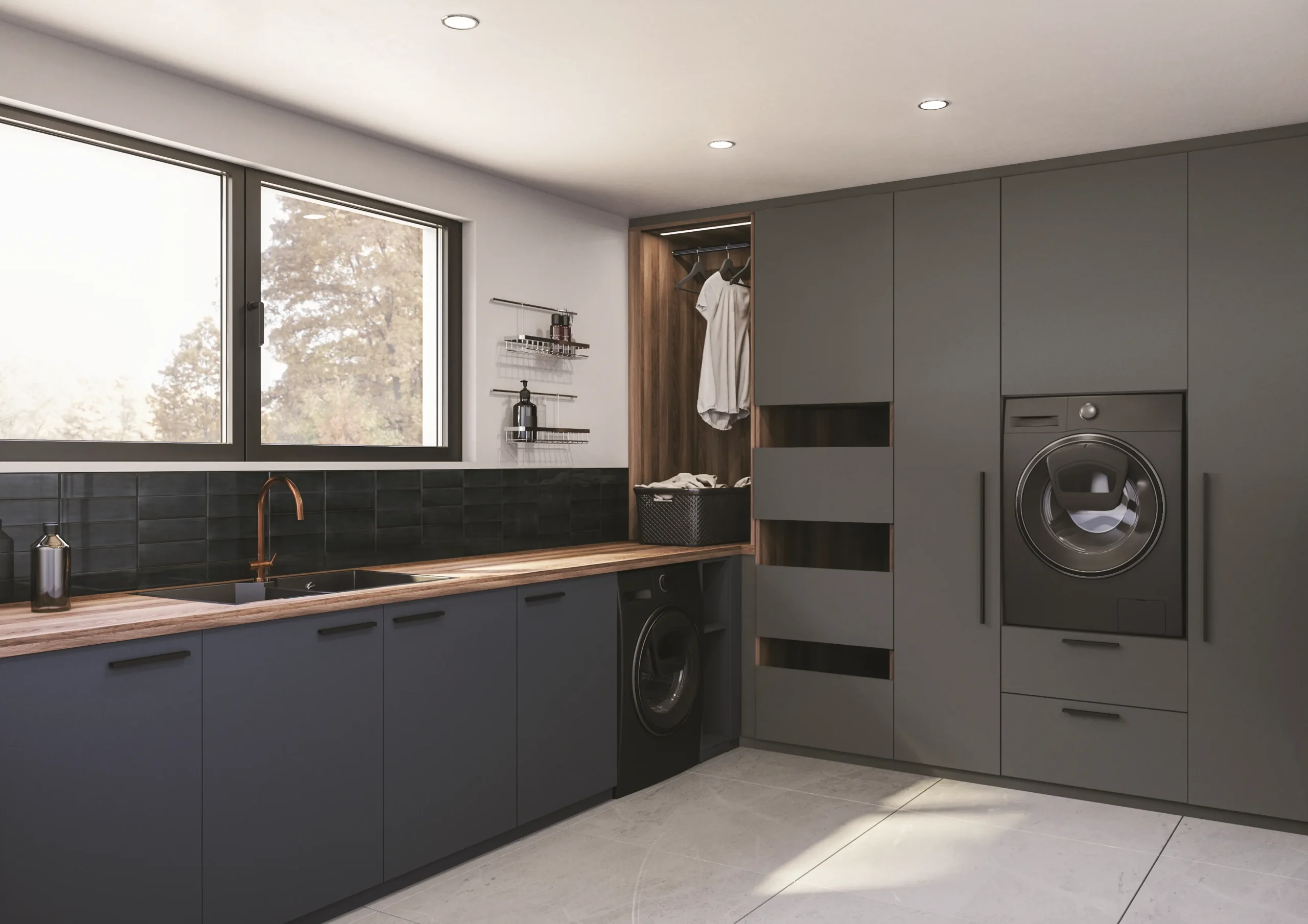 Buanderie sur mesure avec meubles anthracite, plan de travail, lave-linge intégré et rangements toute hauteur
