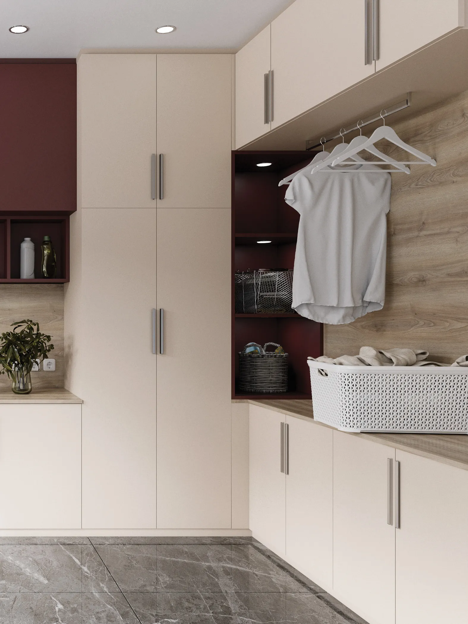 Angle de buanderie avec meubles toute hauteur, plan de travail, espace pour suspendre le linge et rangements fermés dans des tons clairs et chaleureux.