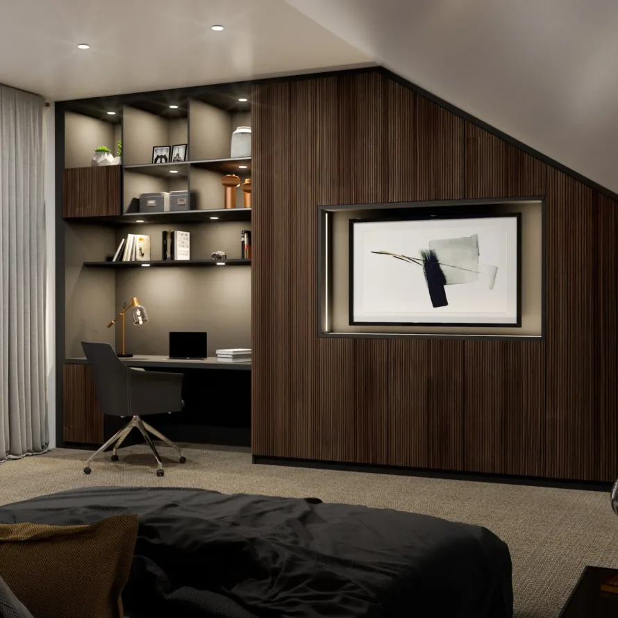 Bureau sur mesure aménagé sous pente avec rangements ouverts, façades bois rainuré et niche décorative éclairée.