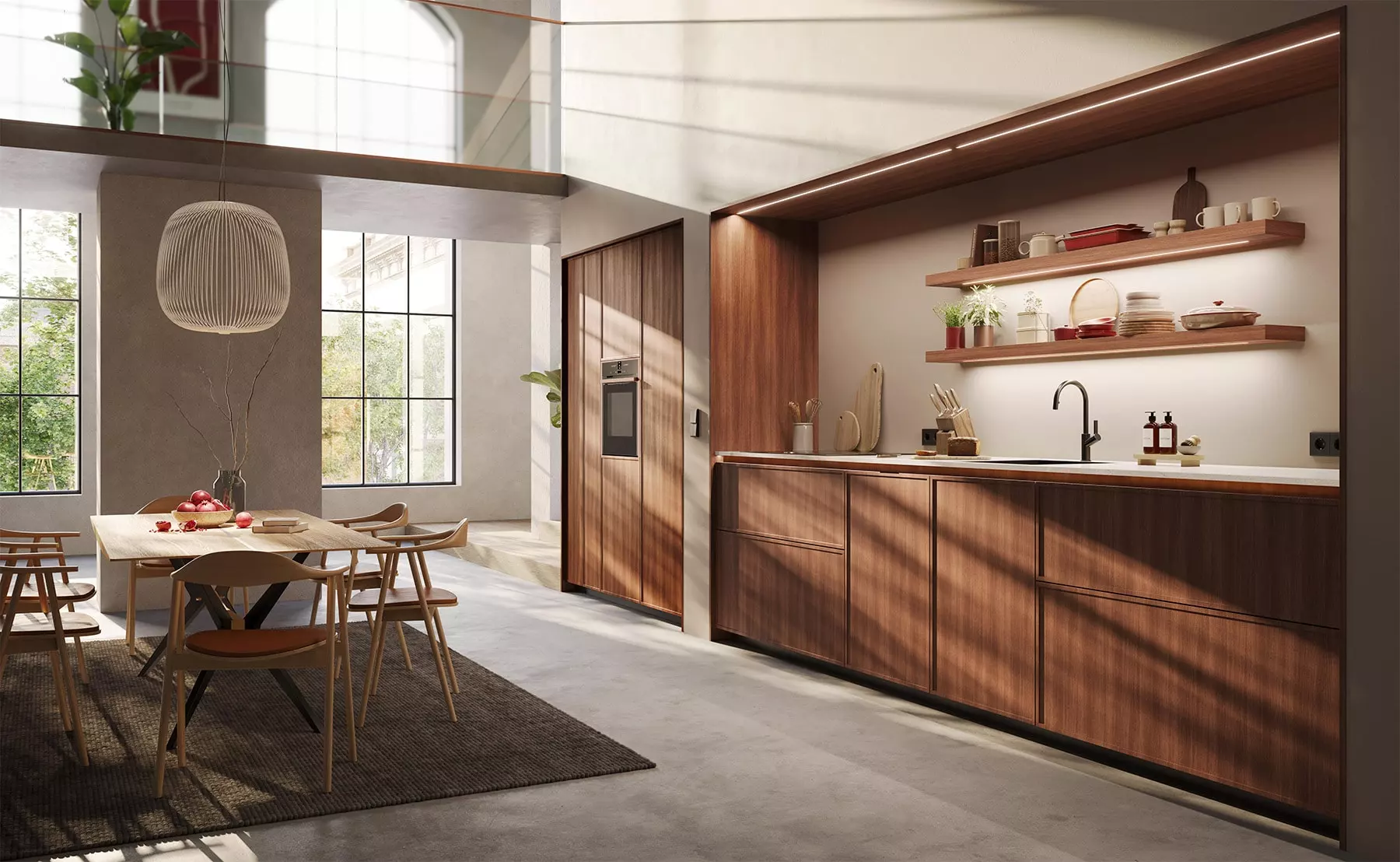 Cuisine en noyer avec grand linéaire mural, étagères ouvertes, plan de travail clair et coin repas dans un intérieur lumineux.