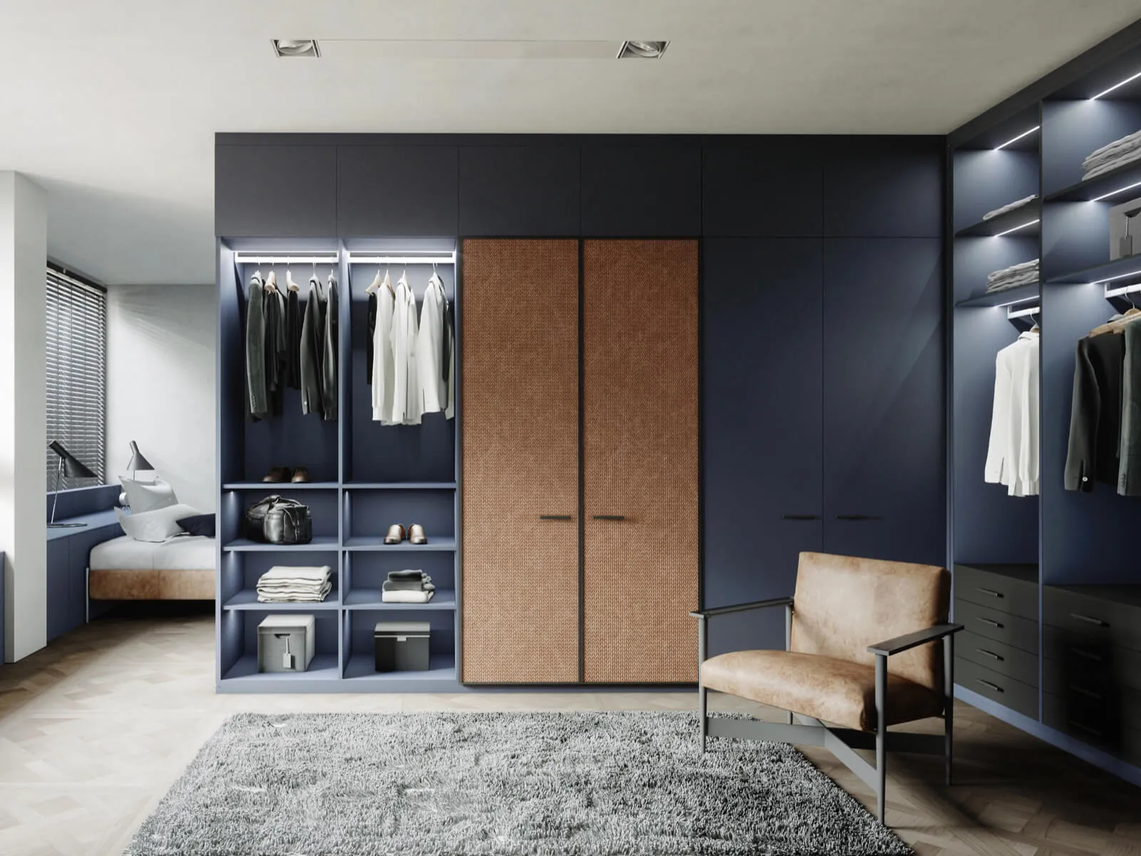 Dressing sur mesure bleu avec penderies ouvertes, portes effet cannage, tiroirs et éclairage intégré.