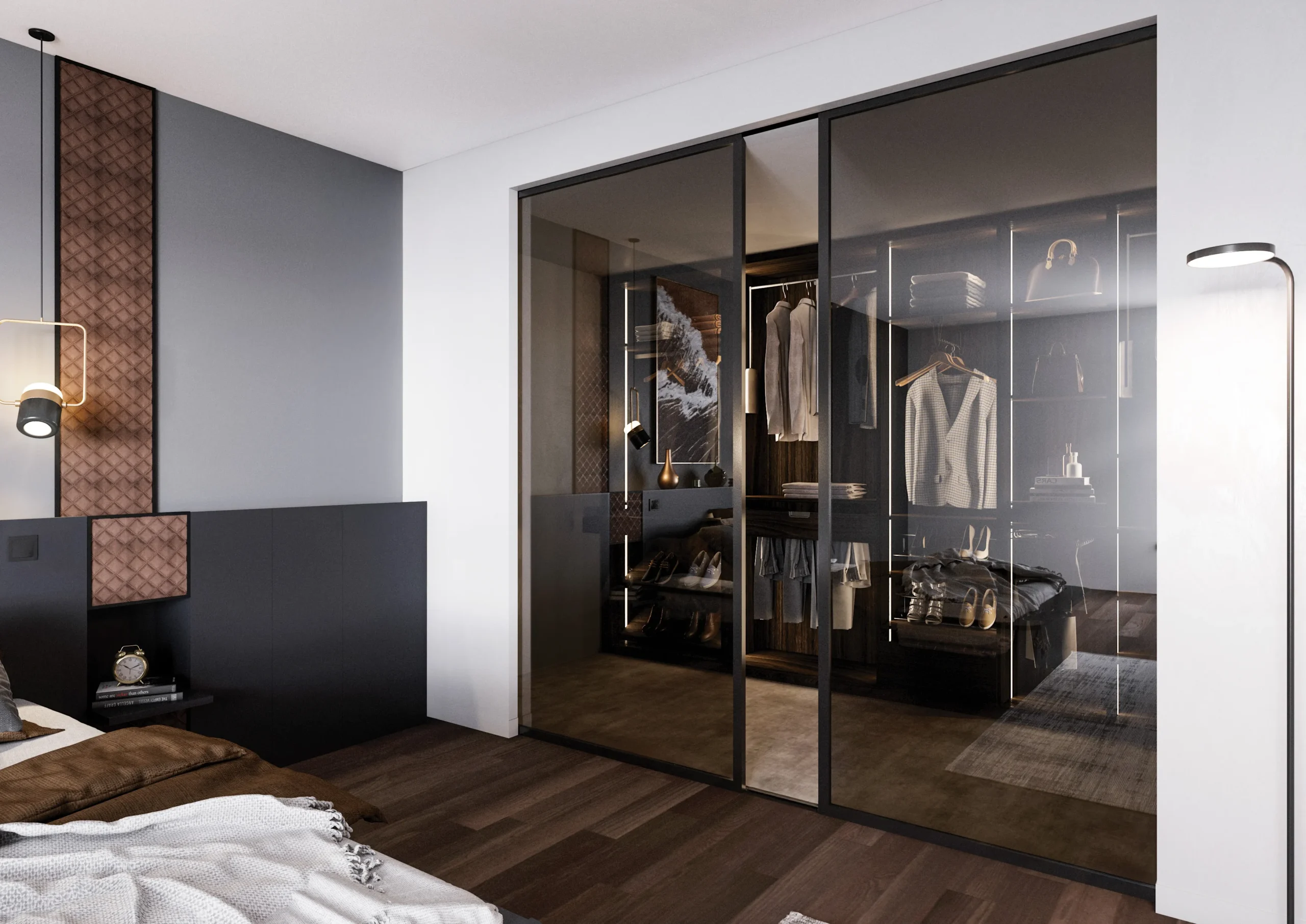 Dressing sur mesure avec portes vitrées fumées, éclairage intégré, rangements ouverts et ambiance chaleureuse dans une suite parentale.