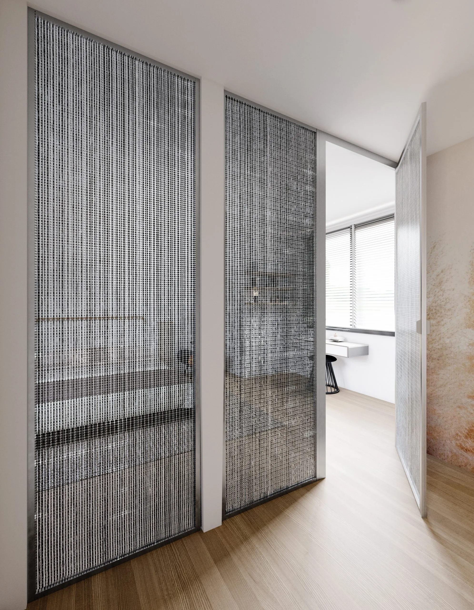 Portes battantes sur mesure avec panneaux texturés gris et passage ouvert vers un espace bureau lumineux.