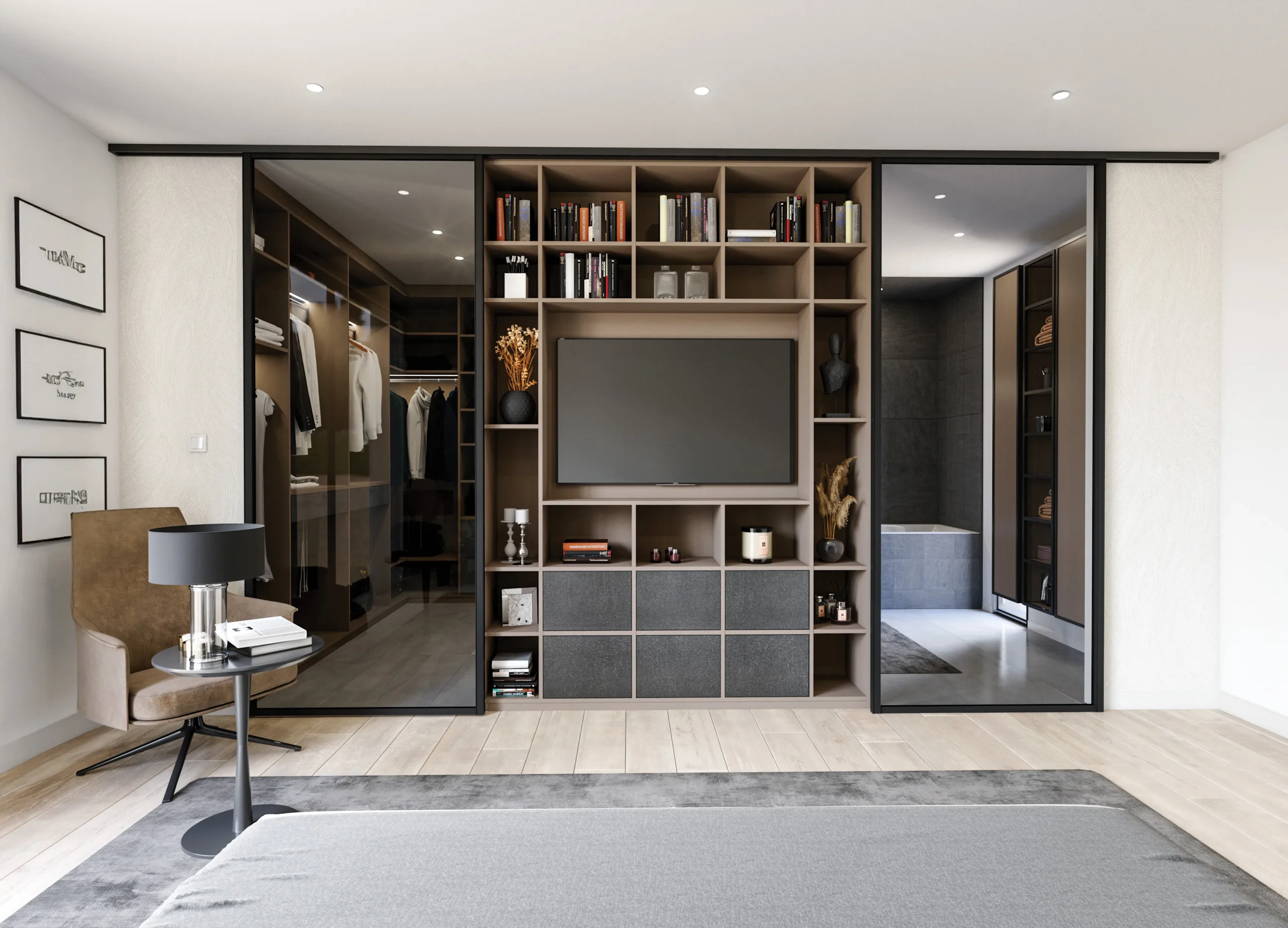 Suite parentale aménagée avec dressing vitré, meuble TV bibliothèque intégré et rangements sur mesure autour de l’espace nuit.