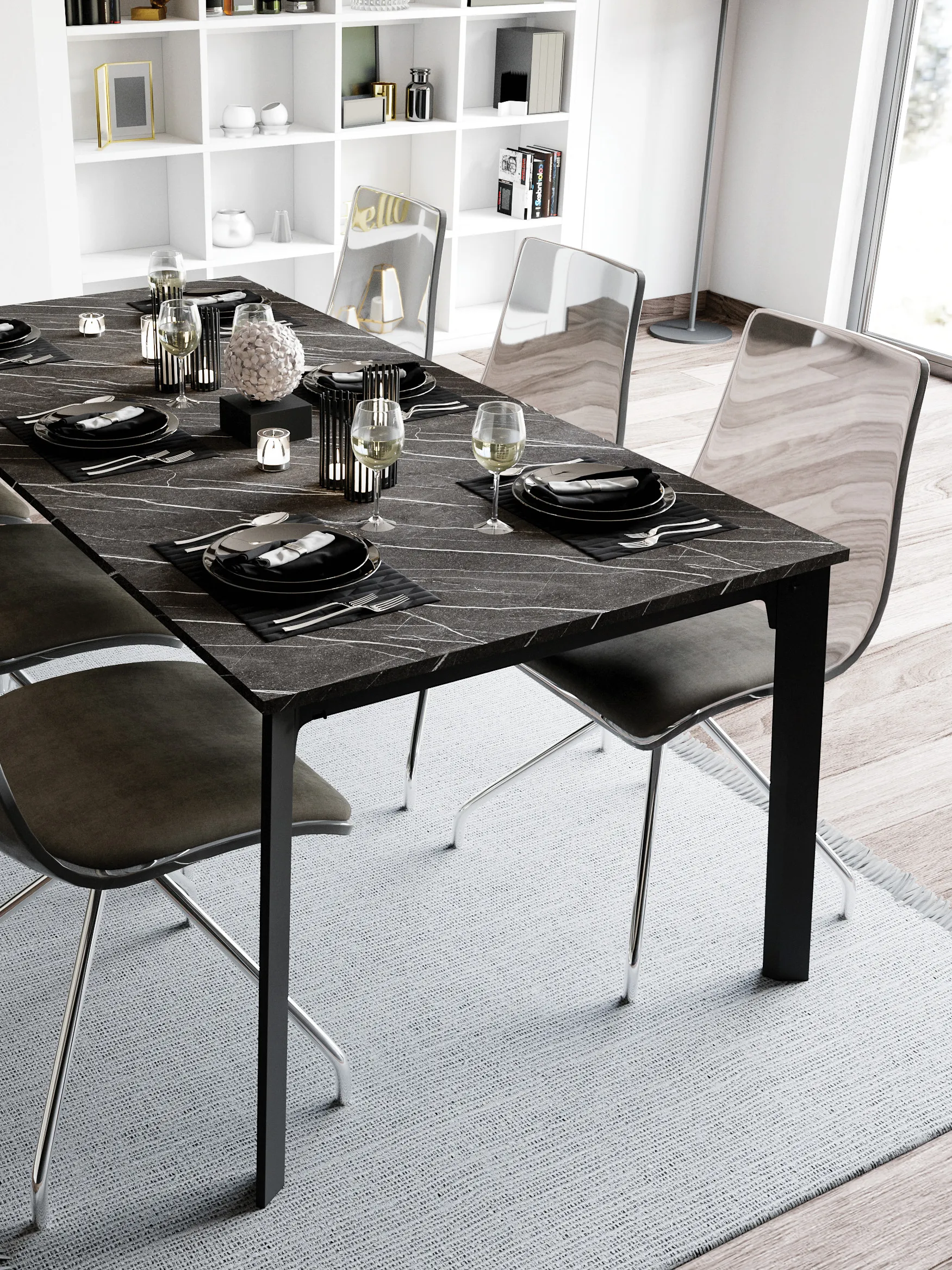 Table de salle à manger avec plateau effet marbre foncé, chaises contemporaines et mise en scène élégante dans un intérieur clair et moderne.