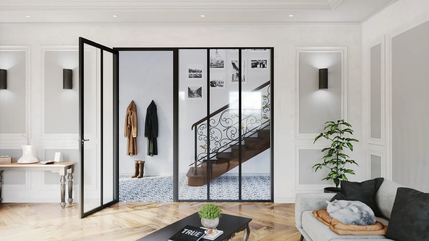 Verrière noire avec porte battante vitrée, séparant le salon de l’entrée avec vue sur l’escalier et les rangements muraux.
